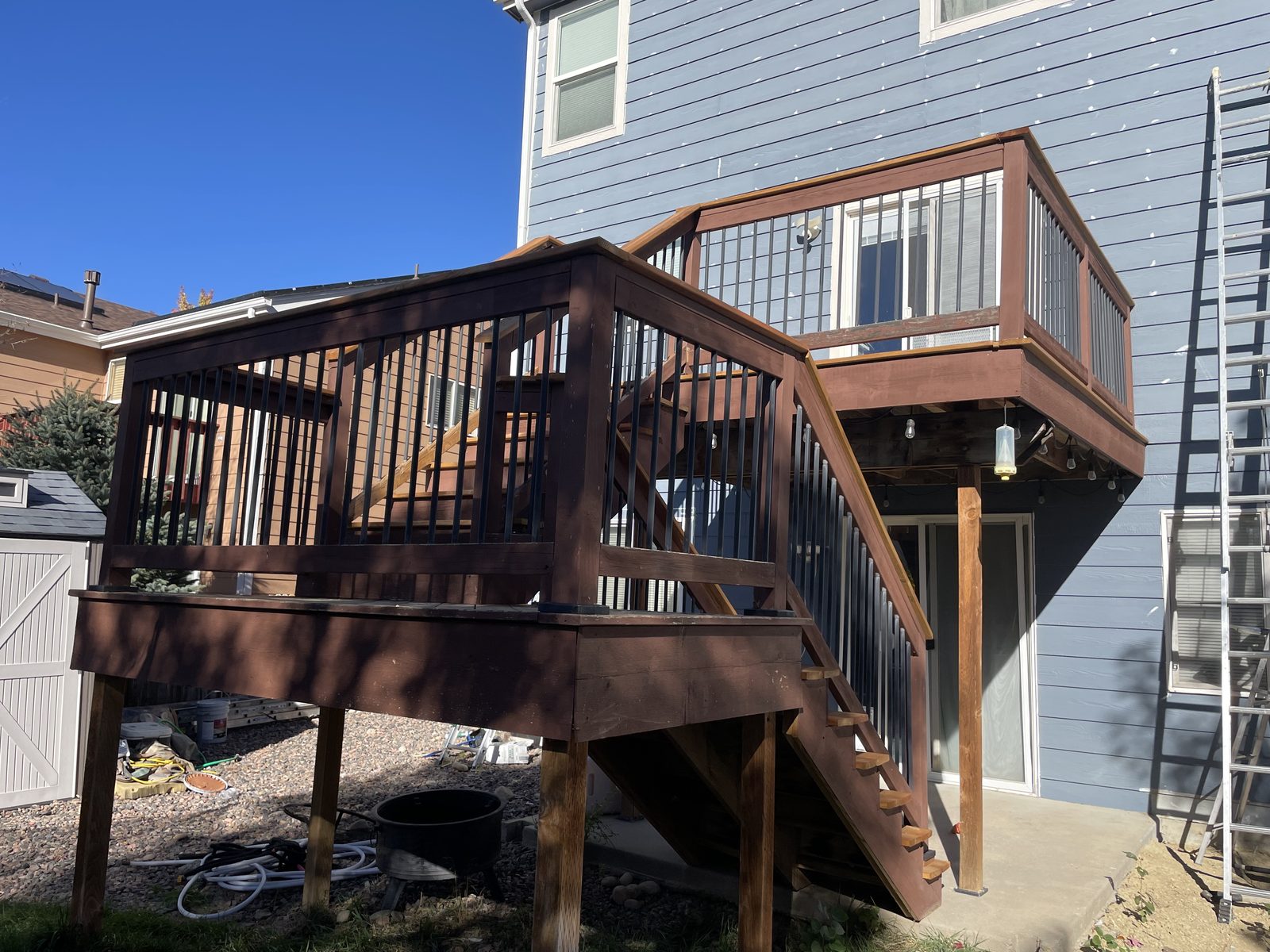 Before: Denver metro · Two-level deck restain · Cedar treads, gray rails